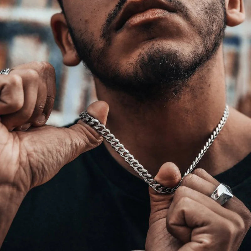 Close-up Silver Cuban Chain Necklace, 3-7mm, Worn on Neck