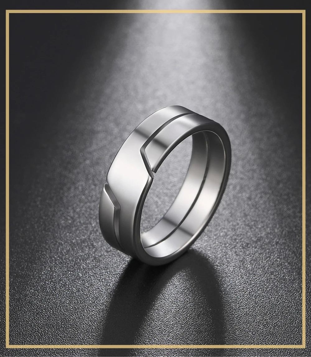 Skyrim stainless steel couple rings displayed side by side on a white background, simple fashion design for men and women.